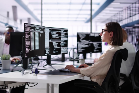 Software Engineer Developer Using Desktop Computer. Coding On PC